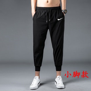 [spot Goods]nike pantalones deportivos casuales Fitness pantalones delgados de baile Jogging Fitness pantalones de rayas pantalones recortados corredores y pantalones de chándal