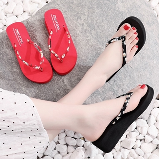 Chanclas de las mujeres ropa de verano nuevo estilo pequeña margarita moda plana pendiente zapatillas antideslizantes simples zapatos de playa sandalias y zapatillas