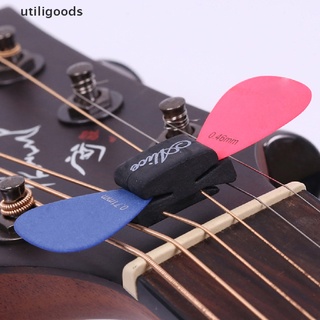 utiligoods lindo accesorios de guitarra 1pc negro goma guitarra púas titular fijar en headstock venta caliente
