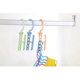 Multifunctional five-hole hanger with handle that can be rotated 360 degrees to complete the hanger