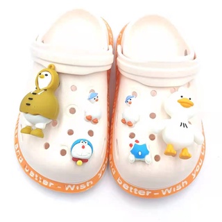 Dibujos animados pato Doraemon sandalias Crocs Jibbitz Charm Set para niños zapatos decorar