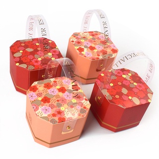 10pcs boda ciruela flor remache pastel caja de caramelos portátil chino festivo rojo bolsa de regalo Octagonal caja de papel