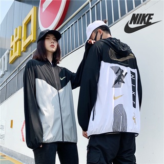 [listo Stock] Nike chamarra de los hombres al aire libre gran logotipo de impresión cortavientos impermeable protector solar chamarra suelta delgada protector solar ropa de la piel de las mujeres pareja chaquetas (1)