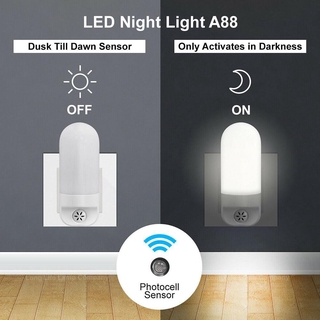 Luz nocturna LED automática enchufe de ahorro de energía al amanecer Sensor de luz de los niños
