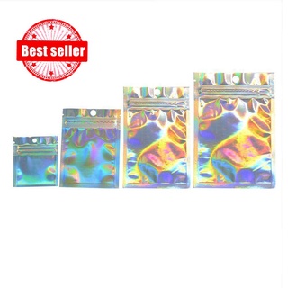 100 piezas Ziplock bolsa de embalaje láser bolsa de embalaje arco iris de aluminio sello sinfonía reflectante bolsa de joyería J8W8