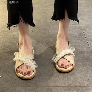 _ sandalias mujeres verano 2021 nuevo estilo de hadas moda todo-partido perla palabra con plano antideslizante romana mujer zapatos