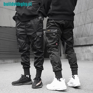 Construir cintas Harem Joggers hombres pantalones de carga Streetwear Hip Hop bolsillos pantalón de pista