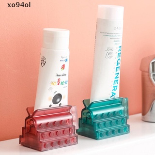 Xo94ol 1 pza dispensador de dientes de baño dispensador de pasta de dientes exprimidor de tubo soporte de rodadura.