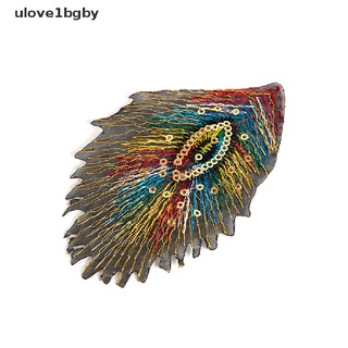 [ulo] 12 pzs plumas de pavo real de color mixto con lentejuelas bordadas para coser en parches insignias.